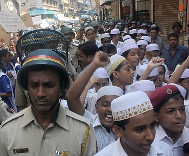 Policemen at a peace rally in Mumbai, September 29