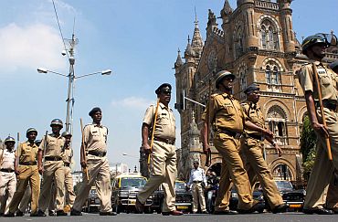 Policemen at Mumbai's Chhatrapati Shivaji Terminus, September 29