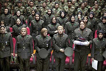 Newly graduated soldiers from the Afghan National Army attend a graduation ceremony in Kabul