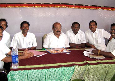 DMK's candidate from Palayamkotti TPM Mohideen Khan (centre) and his supporters