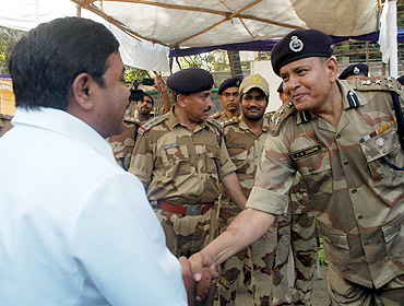 Home Minister RR Patil meets para-military forces deployed at the stadium