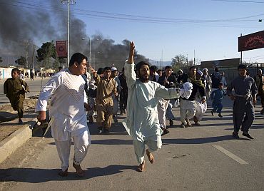 Afghans chant anti-American slogans during a demonstration to condemn the burning of the Quran