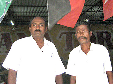 DMK district Councillor Sudhakar (left) with a party worker