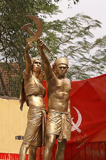 A tableau in a Communist rally in Kerala showing two farmers forming the hammer and sickle