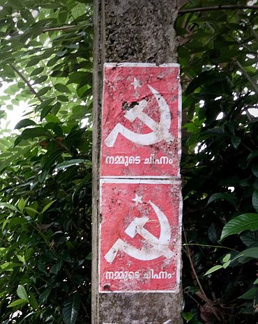 Communist pamphlets on an electricity post