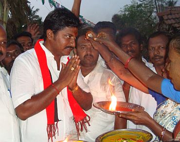 DMK candidate N Anand on the campaign trail in Srirangam