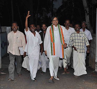 Congress MP Shashi Tharoor, accompanied by his supporters, campaigns in Thiruvanthapuram