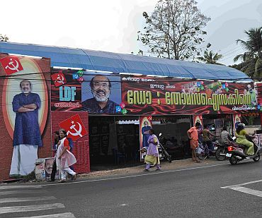 A banner for state Finance Minister Thomas Isaac outside a CPI-M party office