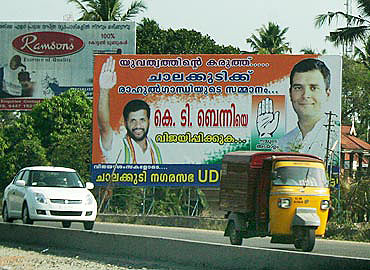 A poster of K T Benny with Rahul Gandhi. Benny was noticed for his work in the Youth Congress.