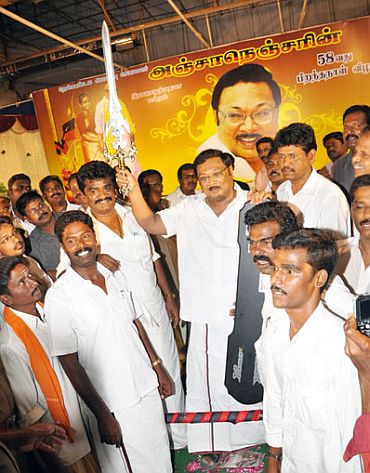Alagiri with supporters in this dated picture