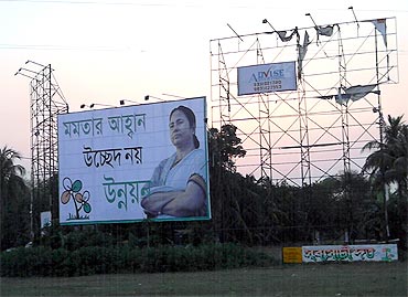 A Mamata Banerjee billboard in Rajarhat, bordering Kolkata, says: 'Mamata's call, not displacement, but progress'