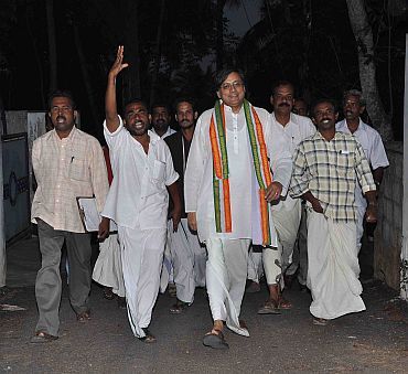 Congress MP Shashi Tharoor, accompanied by his supporters, campaigns in Thiruvananthapuram