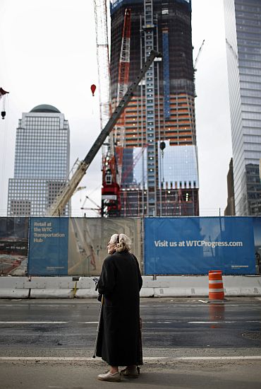 A woman stands on a sidewalk near the World Trade Center Site in lower Manhattan as construction on site continues (Image for representational purposes only)