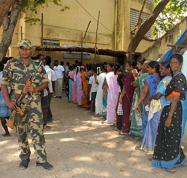 A long queue of female voters at a polling booth in Ozhukarai constituency in Puducherry