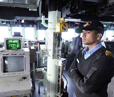 Indian Navy Liaison Officer Lt K Srinivasan observes bridge wing operations aboard the guided-missile destroyer USS Stehem (DDG 63), as part of exercise Malabar 2011