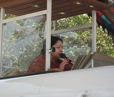 Jayalalithaa addresses the crowd from the top of her van