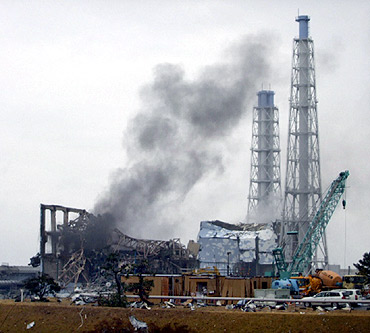 Smoke is seen coming from the area of the No 3 reactor of the Fukushima Daiichi nuclear power plant