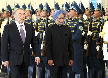 President Nazarbayev and PM Manmohan Singh inspect the guard of honour during their meeting in Astana on Saturday