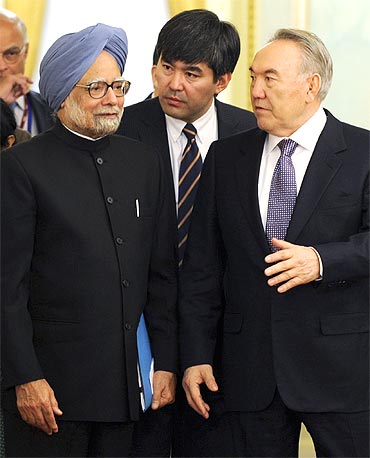 President Nazarbayev talks to PM Manmohan Singh during their meeting in Astana on Saturday