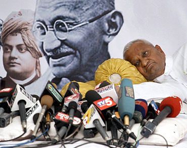 Social activist Anna Hazare rests during a 'fast unto death' campaign in New Delhi April 8, 2011