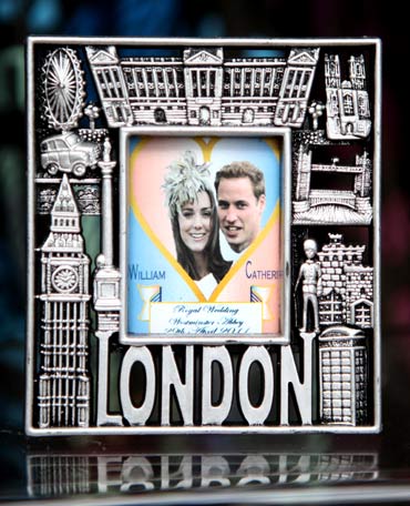 A Royal Wedding souvenir photo frame is displayed for sale in London