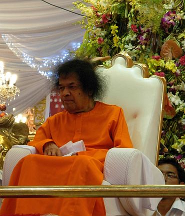 Sathya Sai Baba's devotees pray for a miracle