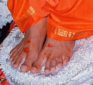 Sathya Sai Baba's devotees pray for a miracle