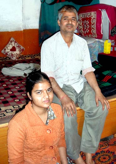 Bharatbhushan Dhar with his daughter, Priyanka