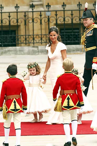 Pippa Middelton, sister of the bride Kate Middleton arrives to the royal wedding