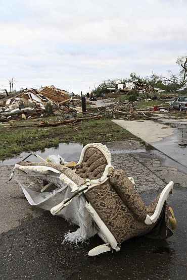 The aftermath of overnight tornadoes leaves ruined neighbourhoods in Pratt City, a suburb of Birmingham, Alabama