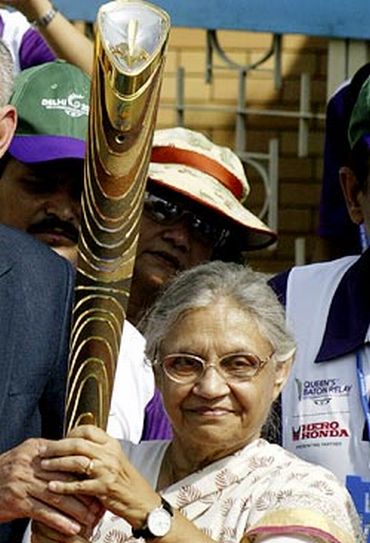 Delhi CM Sheila Dikshit with the Queen's Baton