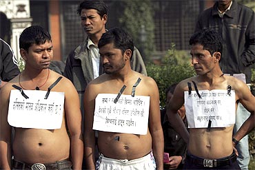 Members of the Dalit community participate in a protest rally