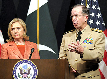 Admiral Mike Mullen with Secretary of State Hillary Clinton at the US embassy in Islamabad