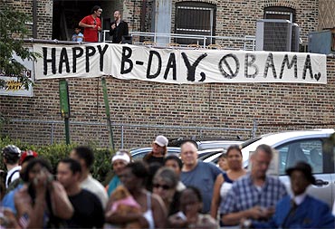 A banner wishes U S President Barack Obama a happy birthday outside of the Aragon Entertainment Center in Chicago