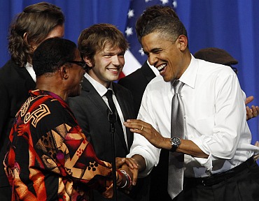 Obama is greeted by musician Herbie Hancock