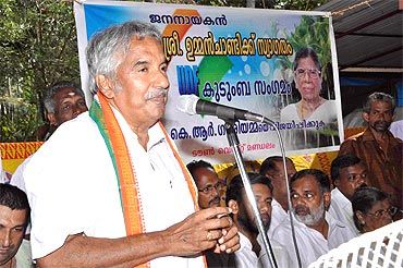 Chandy addressing a campaign rally before the state elections