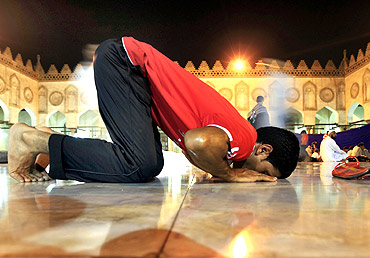 A Muslim man attends an evening prayer called Tarawih in Cairo
