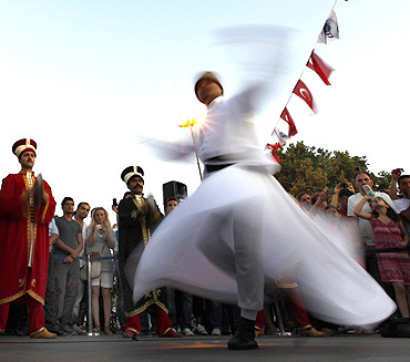 A whirling dervish performs before Iftar in Istanbul