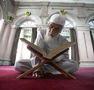 A Nepalese Muslim reads the Quran in Kathmandu