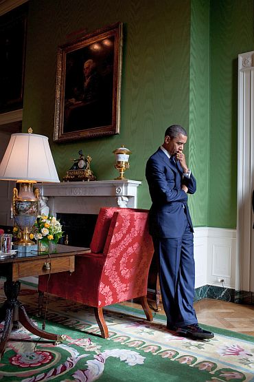 President Obama waits in the Green Room before being introduced at the White House Summit on Community Colleges