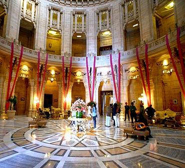 Guests walk through the lobby of Umaid Bhawan Palace, also a Taj hotel, in Jodhpur