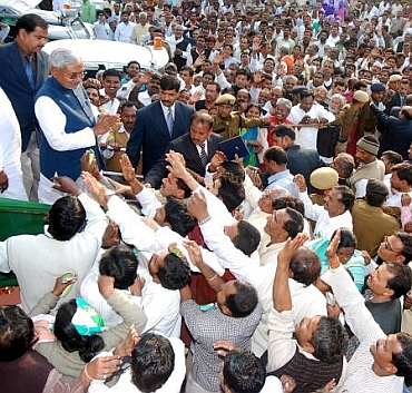 Bihar CM Nitish Kumar interacts with Mahadalits during a rally