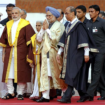 A file photo of Prime Minister Manmohan Singh with Gujarat Chief Minister Narendra Modi