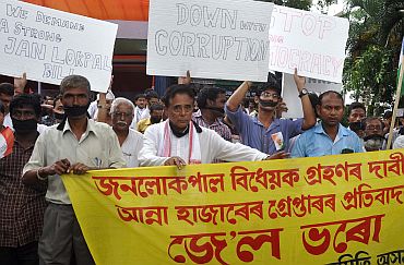 People come out on streets to protest against the arrest of Anna Hazare, in Guwahati on Tuesday