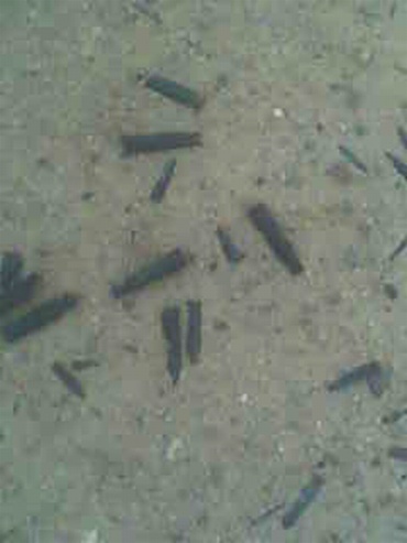 Wasted ammunition can be seen in this picture clicked by Kalvinder Singh, who was also forced to work in the same war-ravaged wasteland