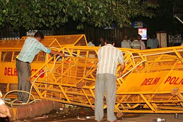 Policemen removing the barricades after the protest