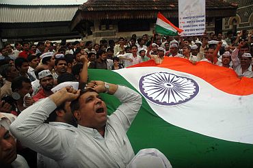 Anna Hazare's supporters protest in Mumbai on Sunday