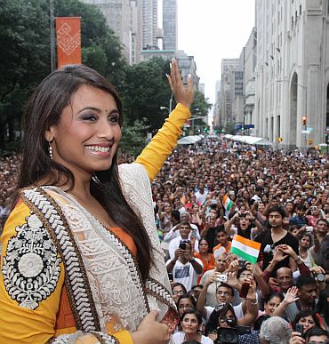 Rani waves to the audience