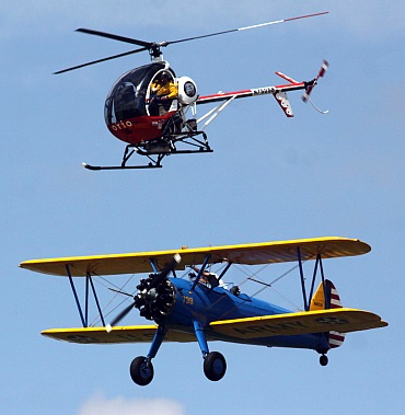 IN PICS: Wing walker plunges 200 feet to his death