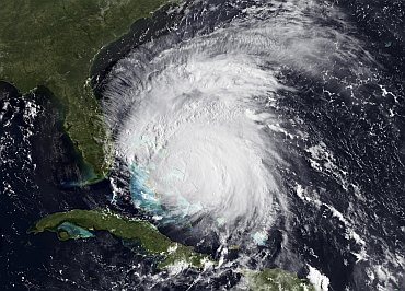 Image shows a visible view of Hurricane Irene captured by the GOES-East satellite